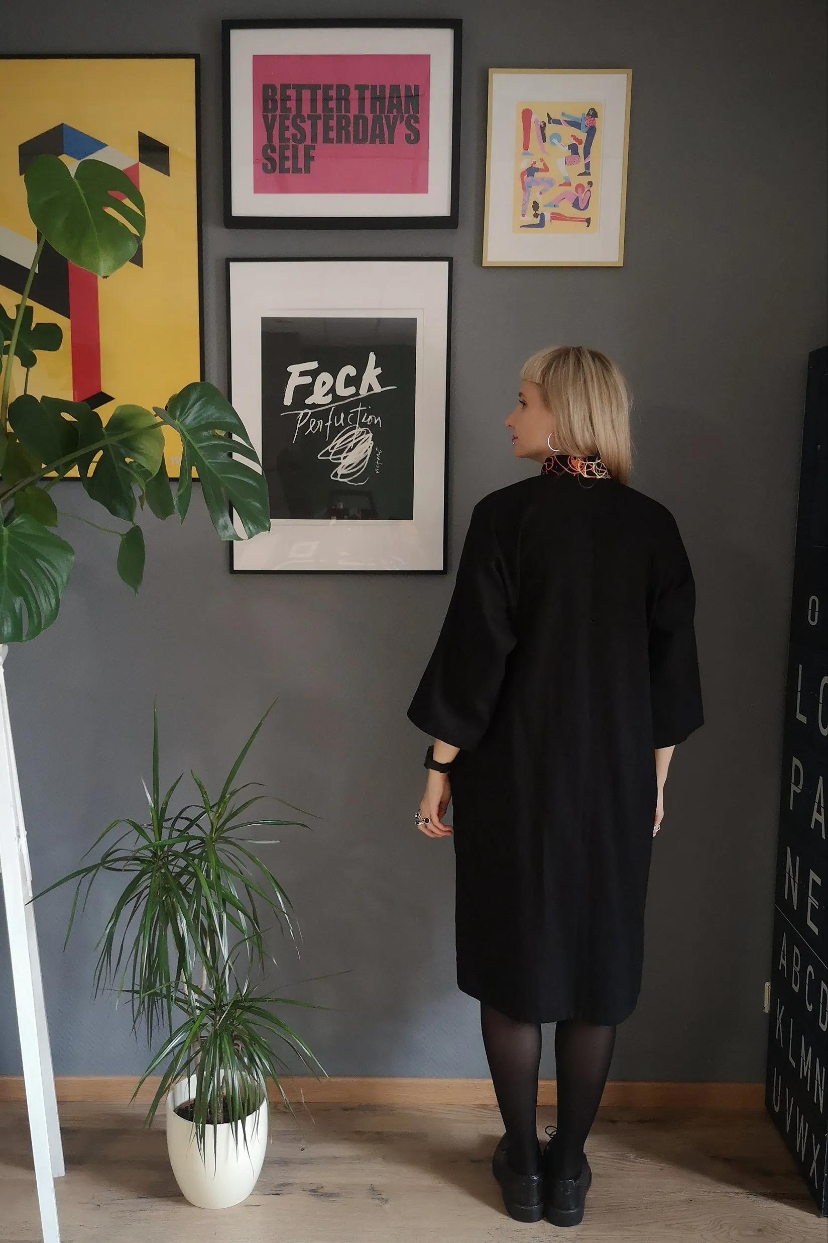 Cool, Comfortable, Versatile Simple Cut Oversized Shirt Dress "Bell Hooks" made in Black Linen Blend fabric with Rainbow  Lāčplēsene patterned Linen details. 