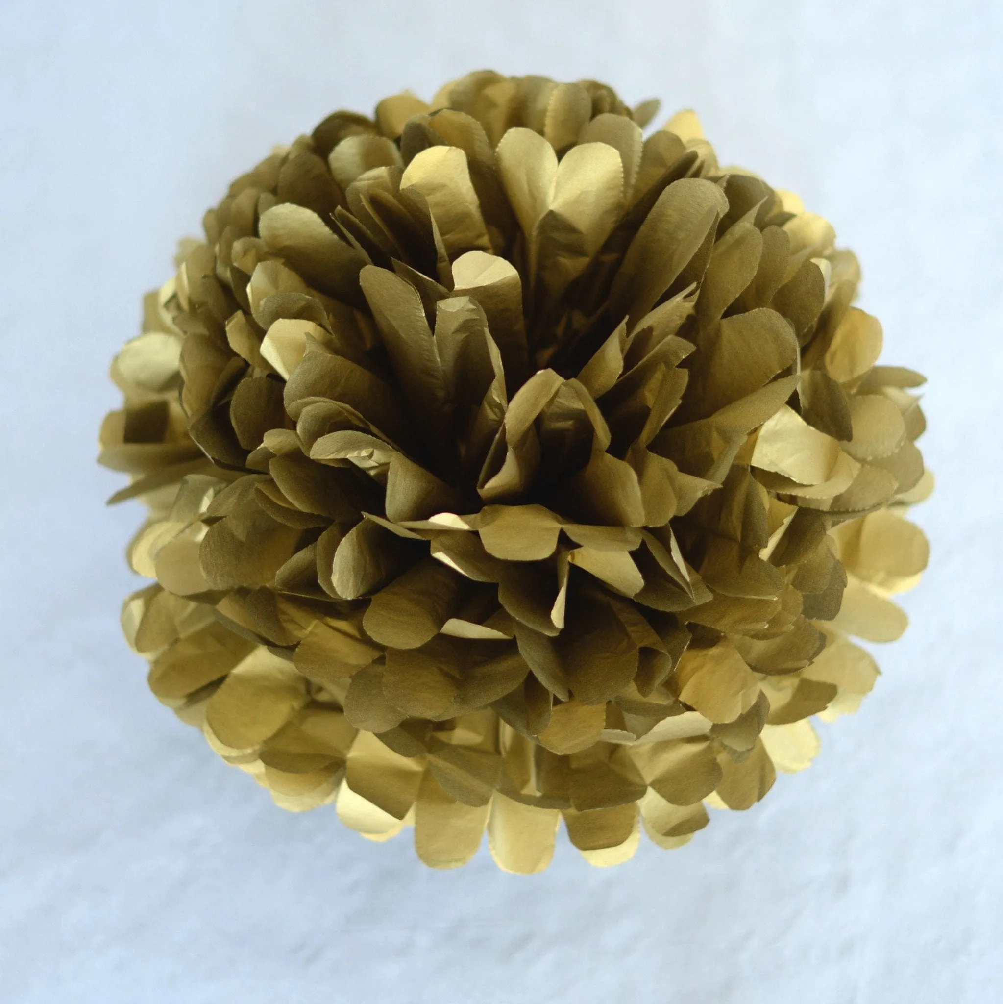 Metallic gold paper pom pom