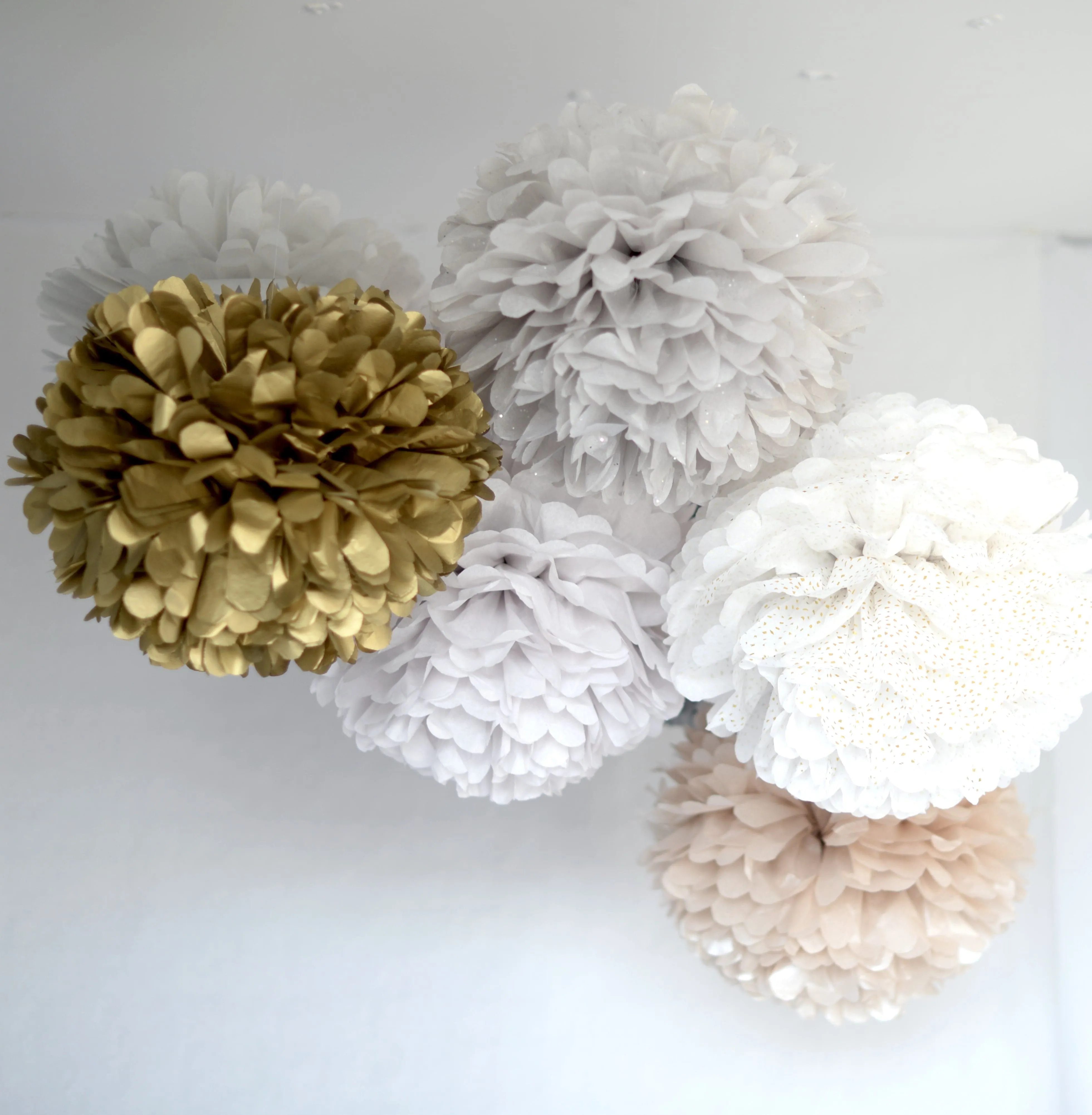 Metallic gold paper pom pom